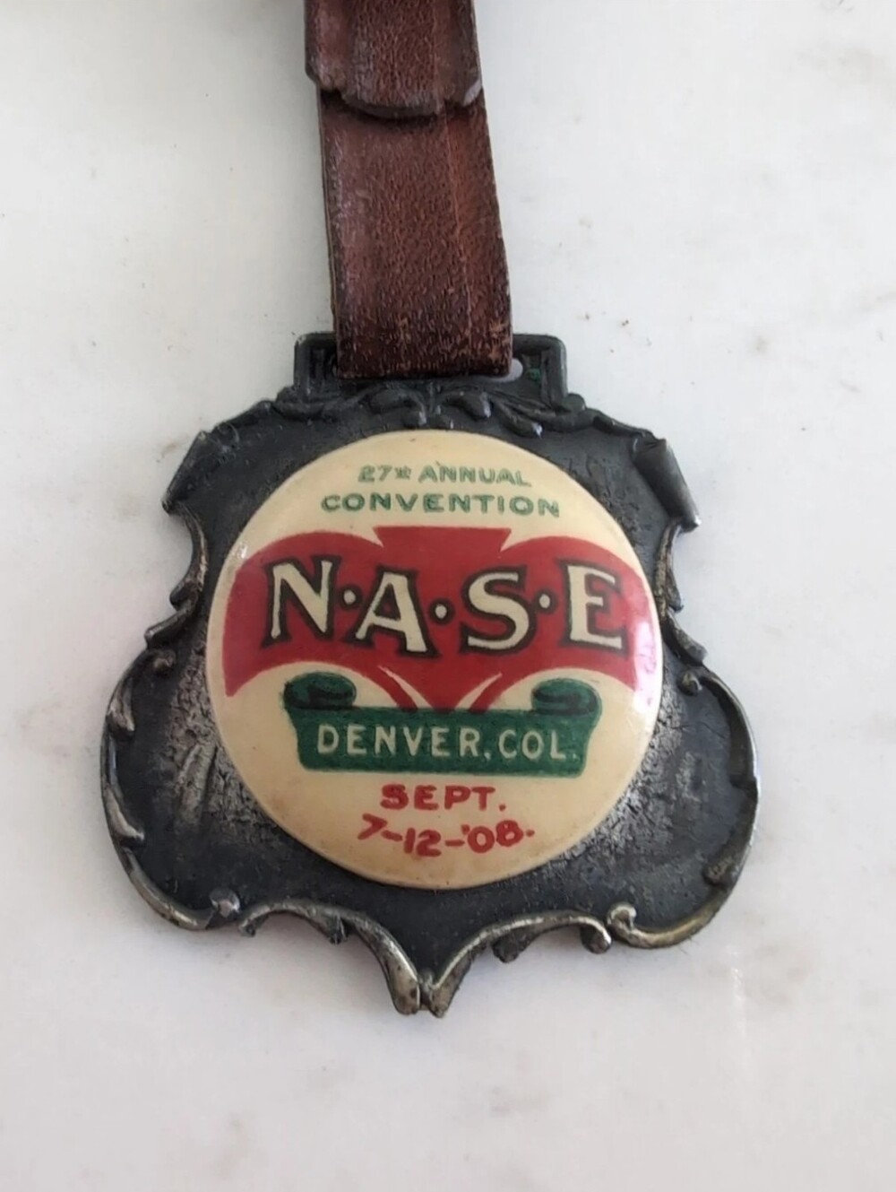N.A.S.E. 27th Annual Convention Vintage Badge - Red & Cream